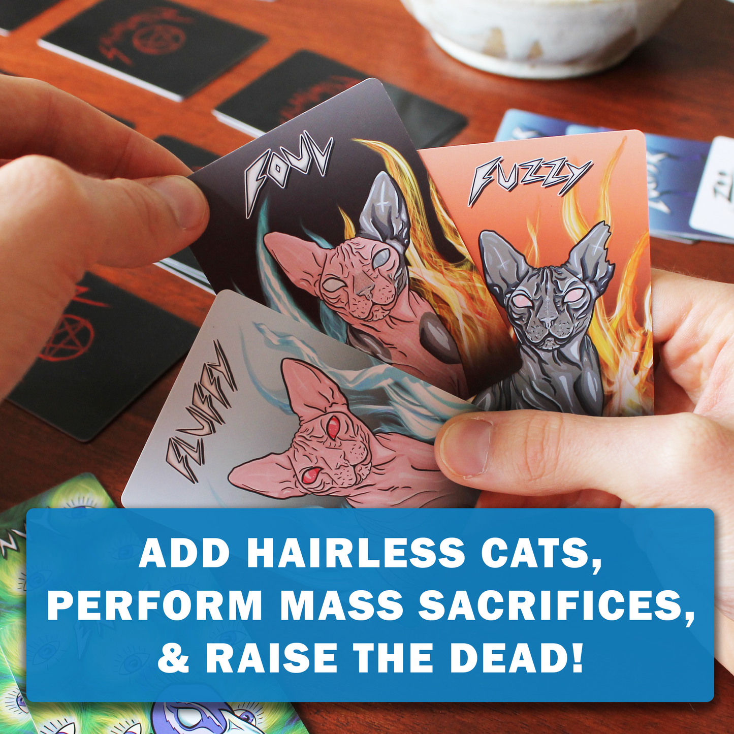 Close-up of SATANIMALS cat cards – Fluffy, Fuzzy & Foul in heavy-metal art style