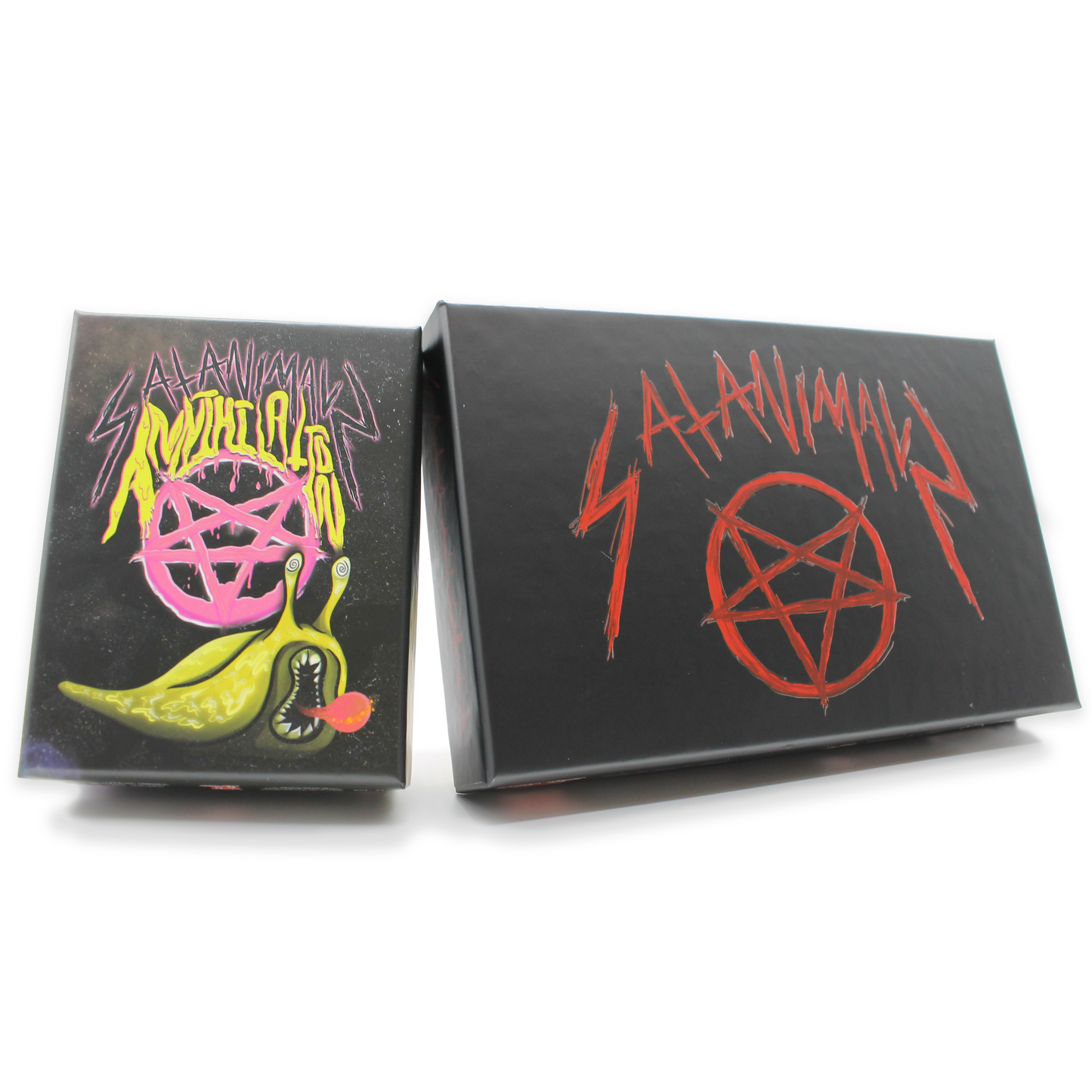SATANIMALS cute goth card game next to SATANIMALS: Annihilation cosmic horror expansion