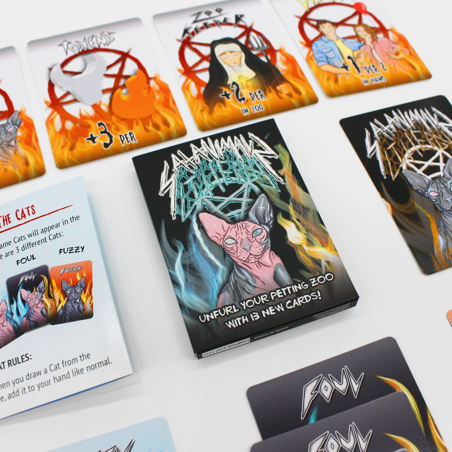 Littergy expansion box angled view with demonic cat illustrations