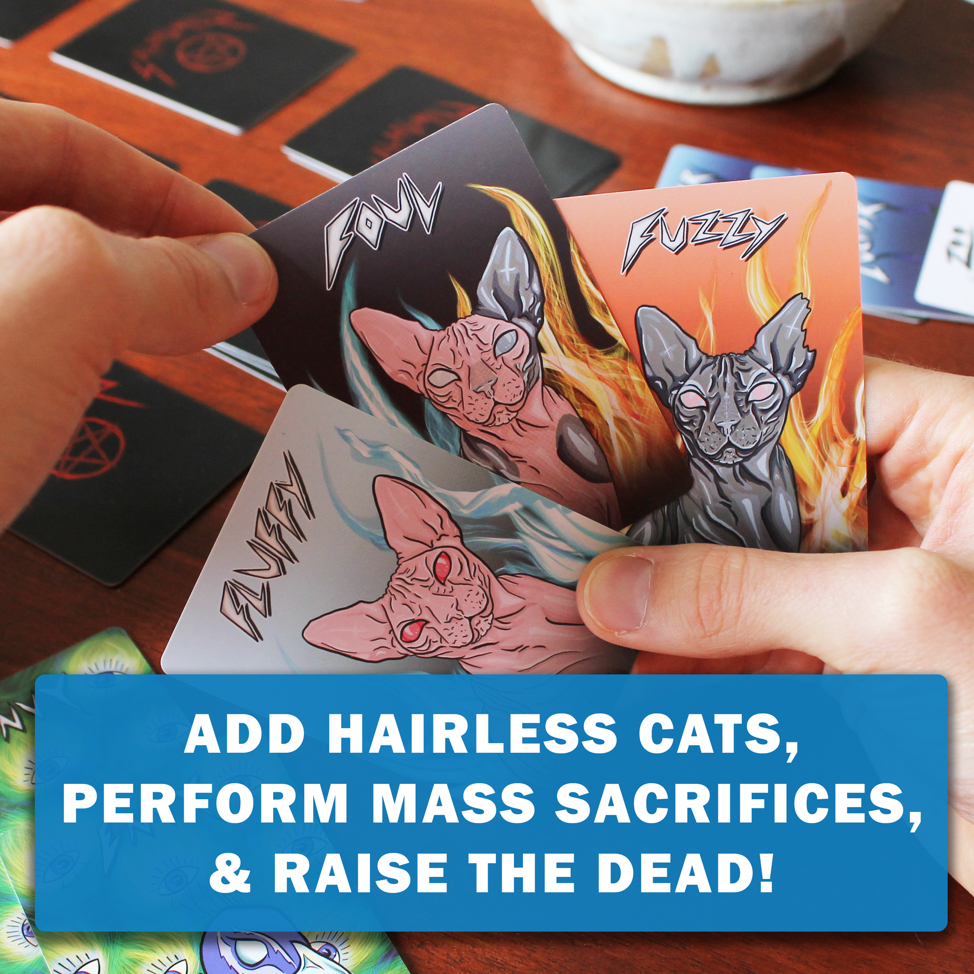 Close-up of SATANIMALS cat cards – Fluffy, Fuzzy & Foul in heavy-metal art style
